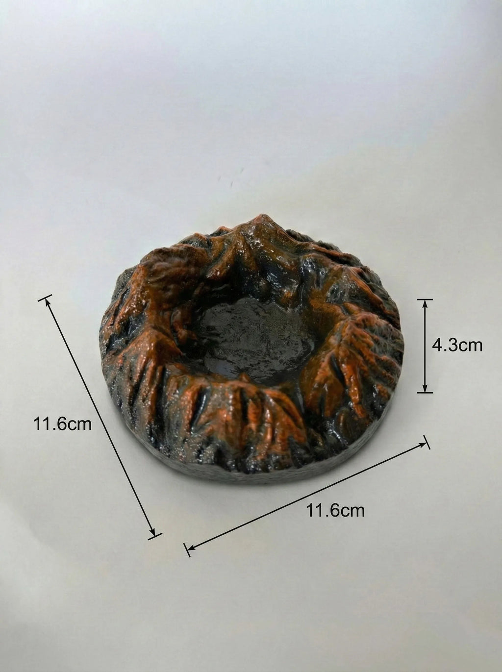unique Black Magma ashtray with measurements on a white background
