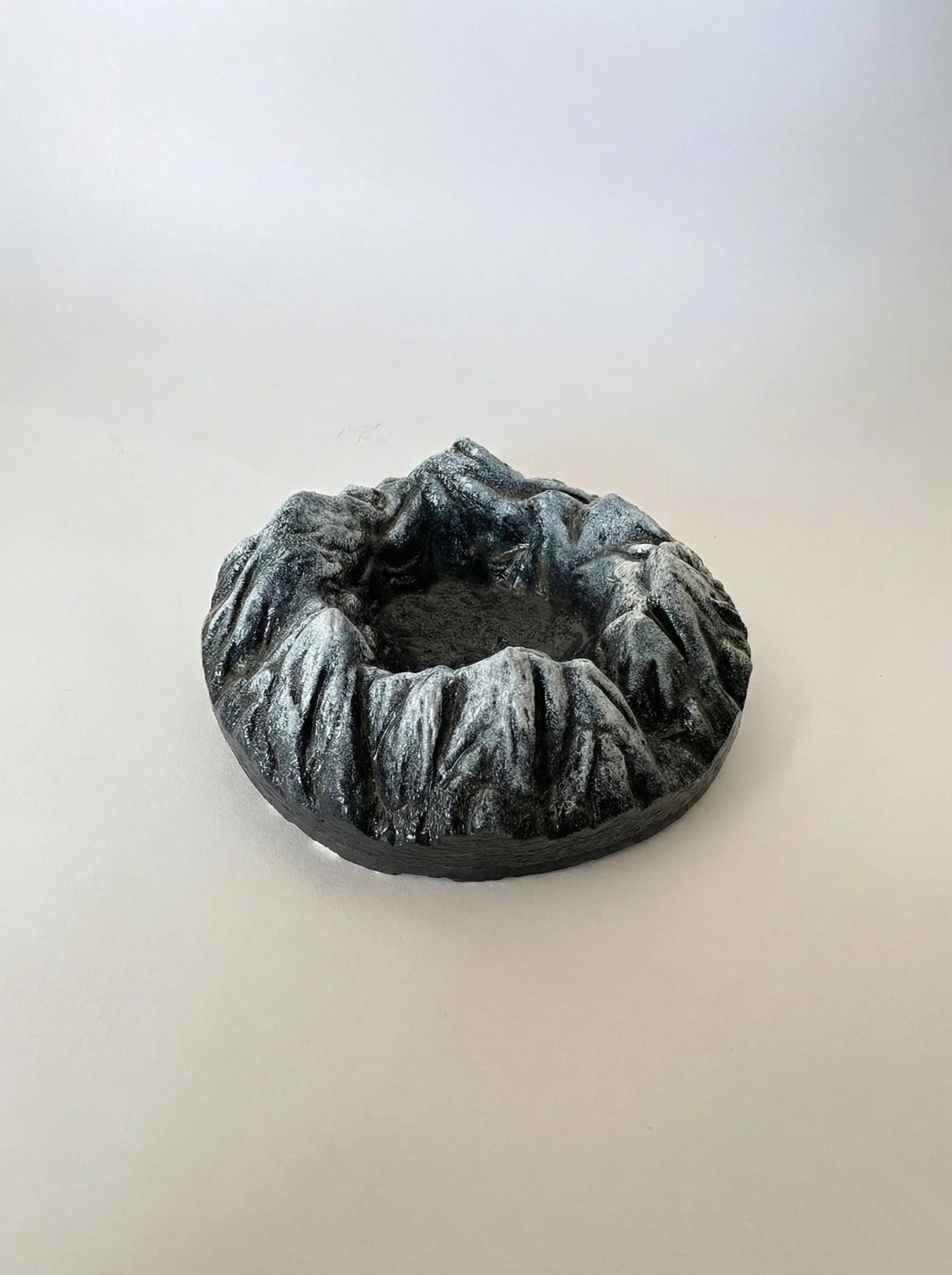 Decorative Himalaya Ashtray on a light gray background