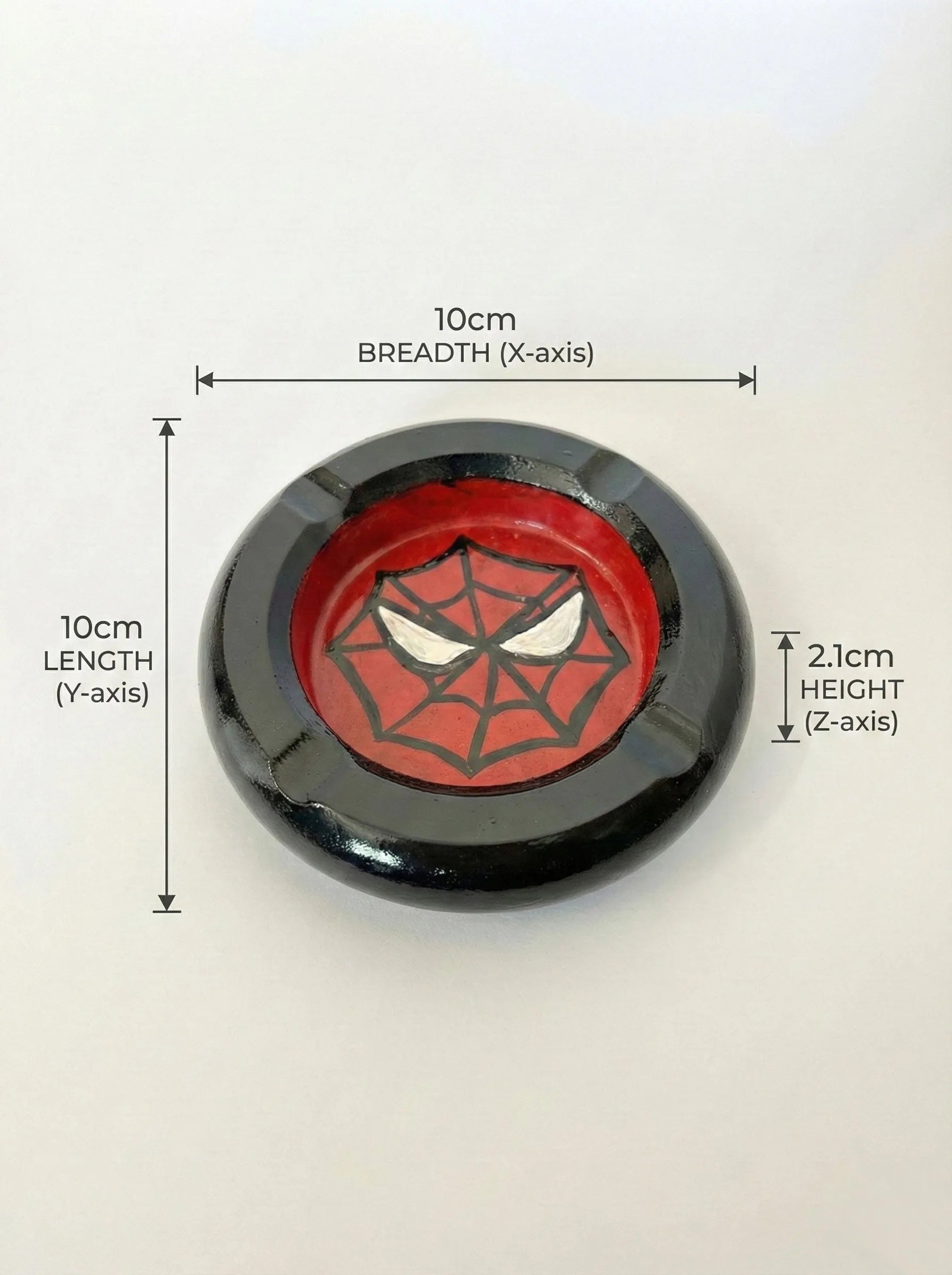 Spider-Man themed concrete ashtray with dimensions labeled on a white background