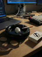 Smoking scene with an ashtray, lit cigarette, and 'Dankforge' brand box on a desk.